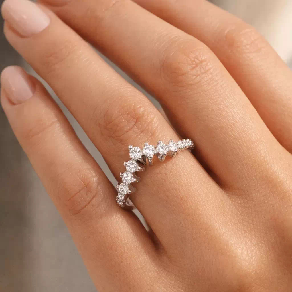 Graduated diamond wishbone ring with chevron design