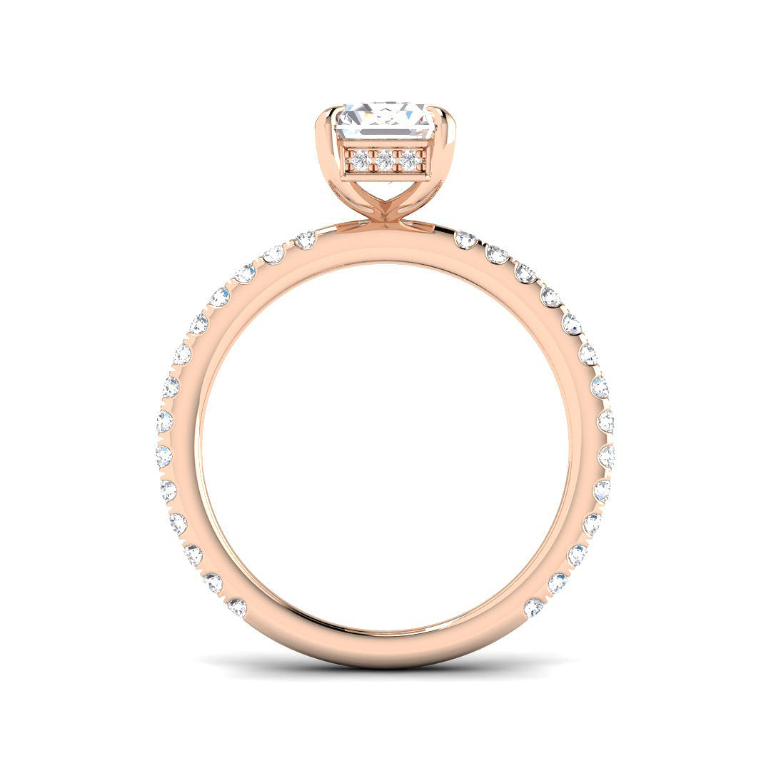 Elegant emerald cut diamond solitaire engagement ring with pavé band in rose gold, available with natural or IGI certified lab grown diamond (D color, VVS clarity).