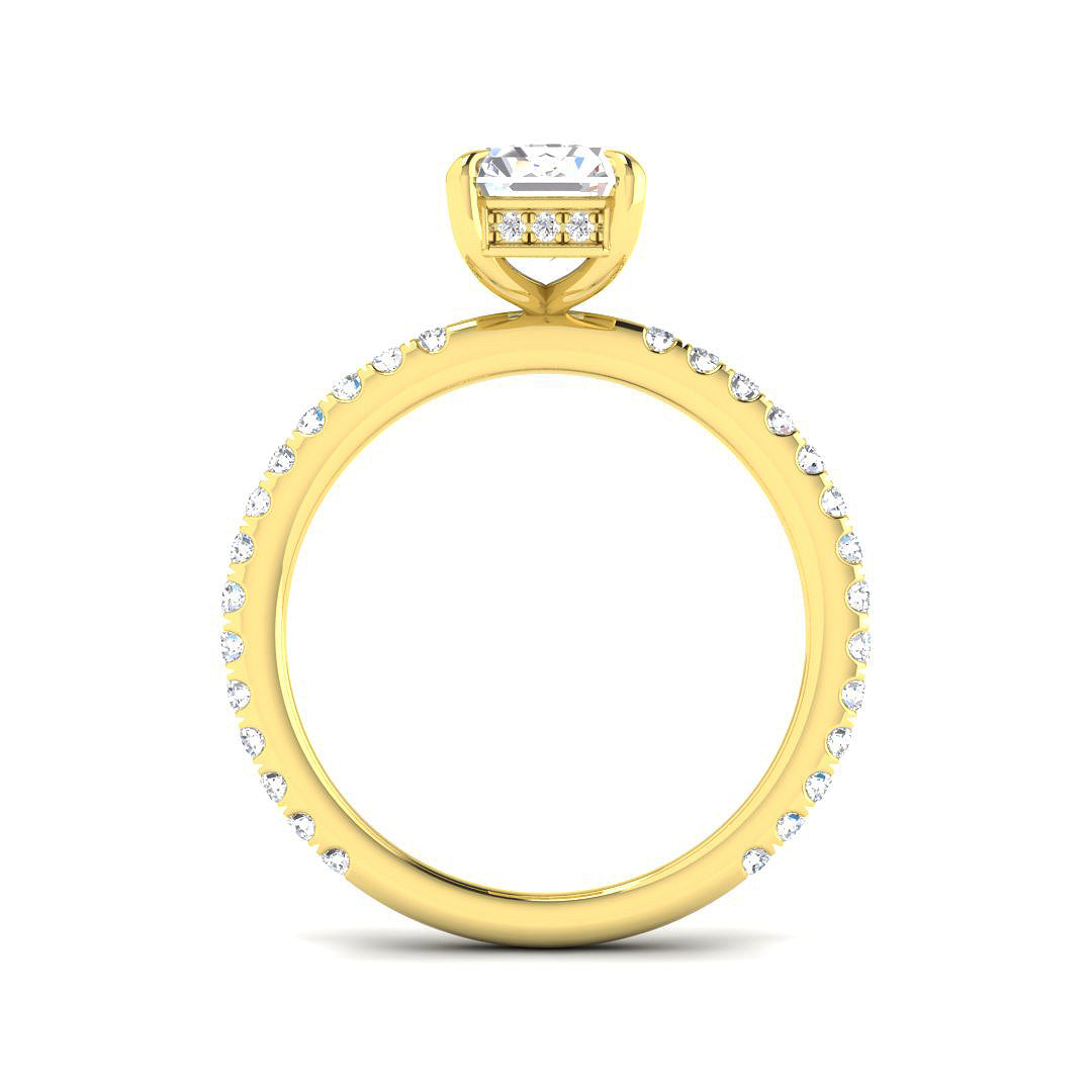 Gold ring with a diamond on a white background