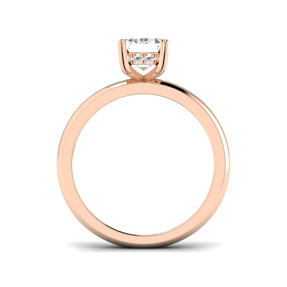 Luxury emerald cut diamond solitaire ring in rose gold with refined proportions