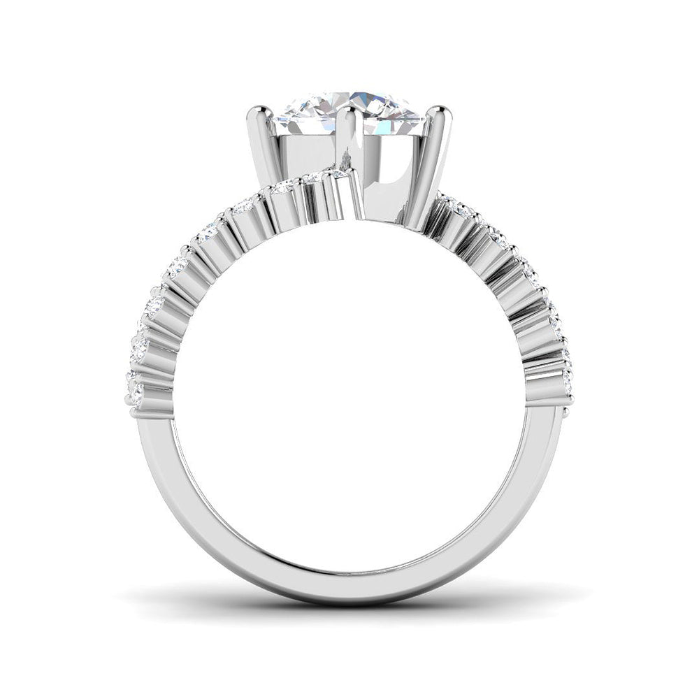 Luxury engagement ring with round centre diamond and oval accents