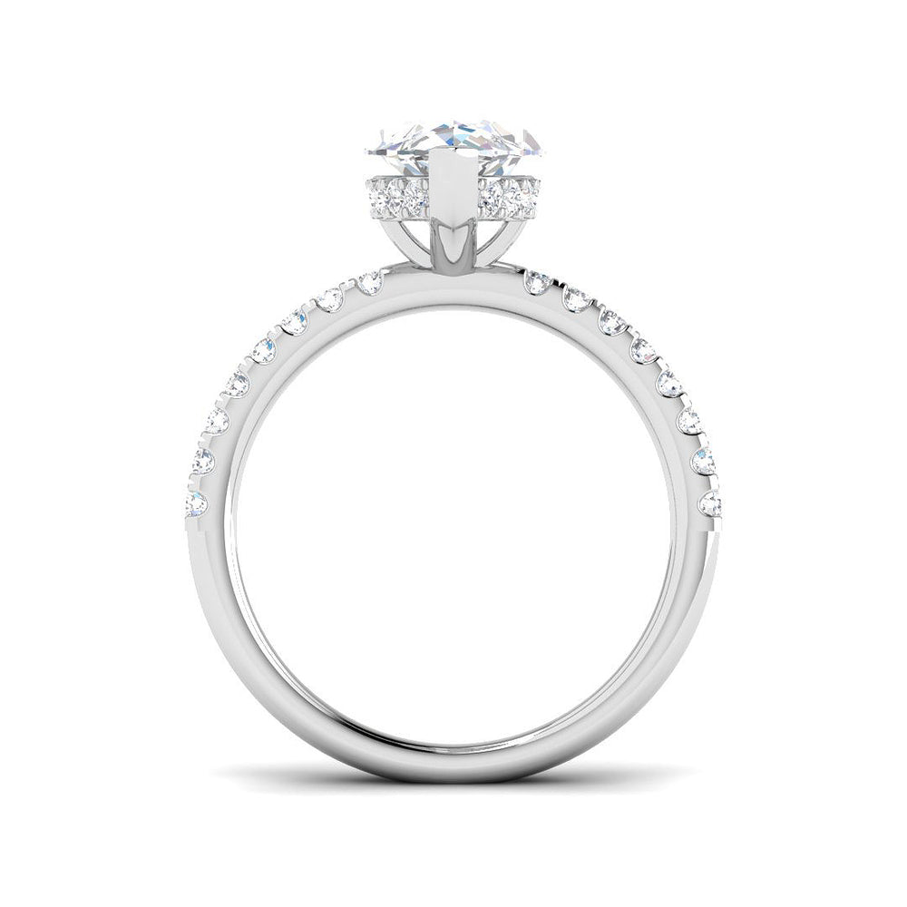 Luxury marquise diamond solitaire ring with pavé shoulders crafted in white gold