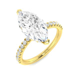 Elegant marquise diamond ring in yellow gold with sparkling pavé-set accents