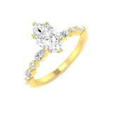 Marquise cut diamond engagement ring in yellow gold featuring natural or lab grown diamond with accent diamond band