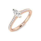 Marquise diamond engagement ring featuring pavé diamond setting