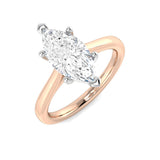 Marquise diamond solitaire engagement ring in rose gold with an elegant minimalist design