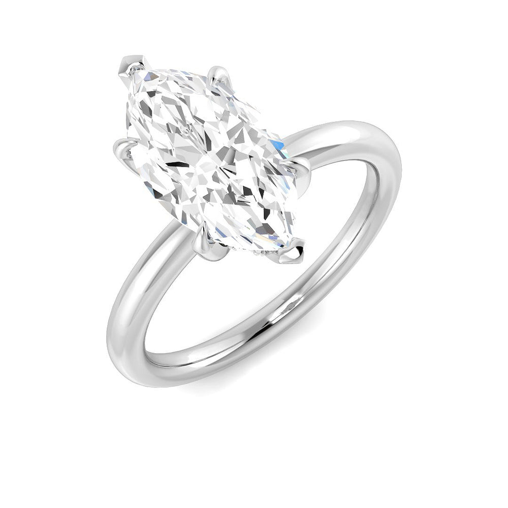 Marquise diamond solitaire engagement ring in white gold with a plain polished band and classic prong setting