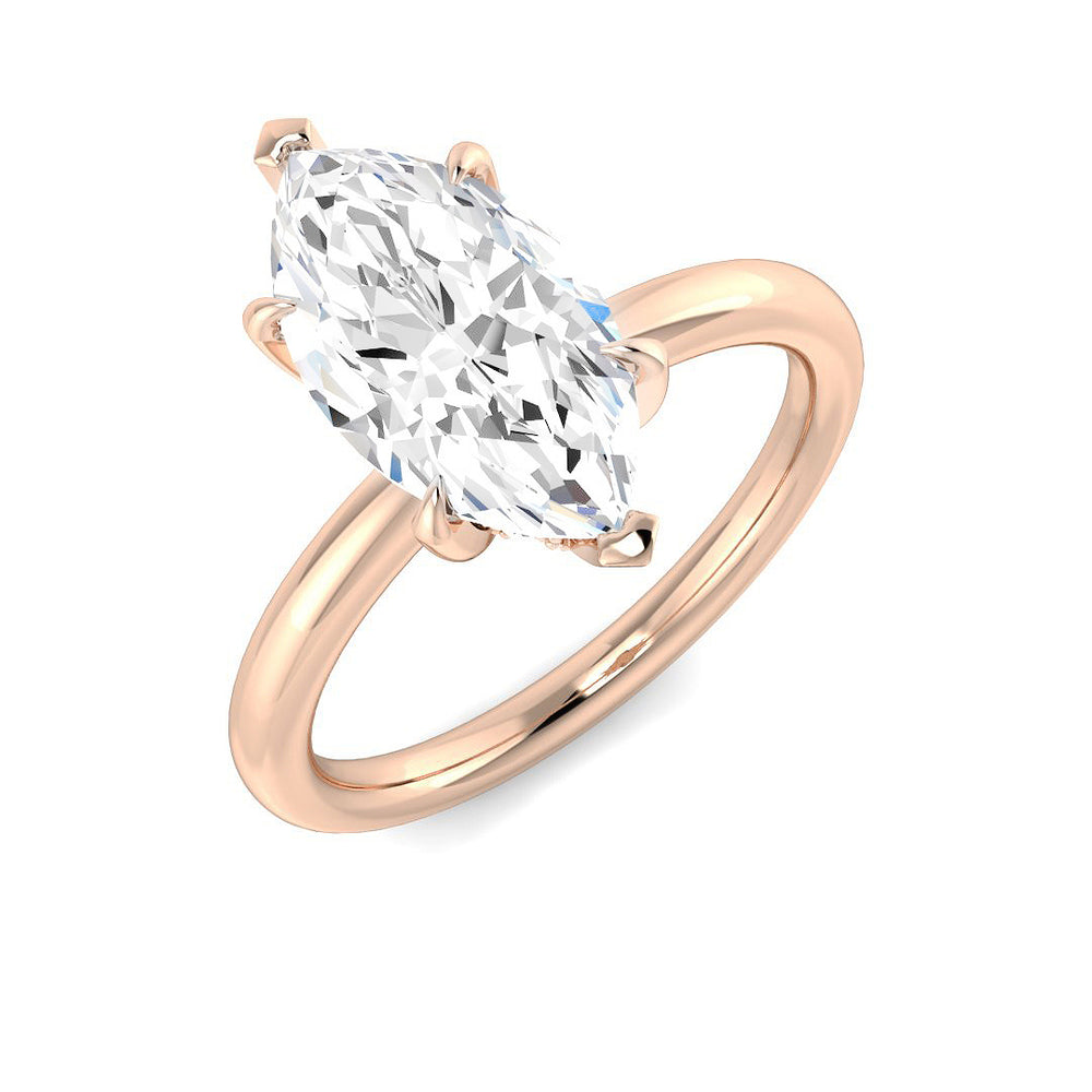 Marquise diamond solitaire ring in rose gold with a refined elongated silhouette