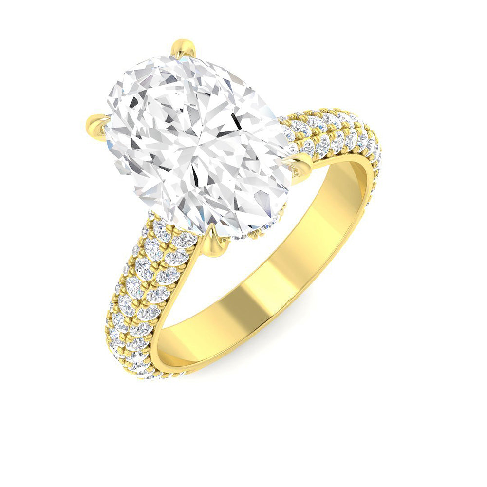 Oval cut diamond engagement ring with double pavé band in yellow gold