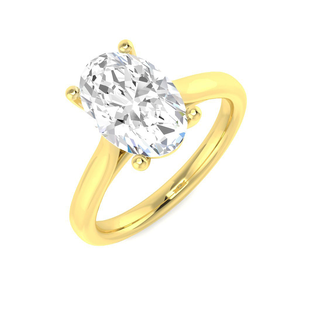 Oval cut diamond solitaire engagement ring in yellow gold with elegant oval centre stone.
