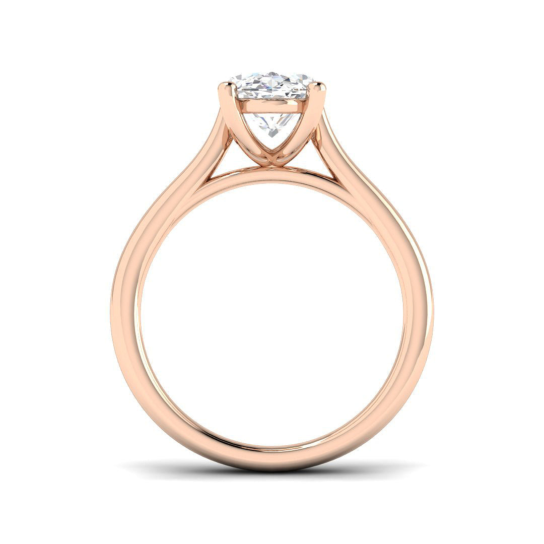 Oval cut diamond solitaire engagement ring in rose gold featuring a timeless solitaire design.