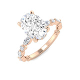 Oval diamond solitaire engagement ring in rose gold with marquise and round accents