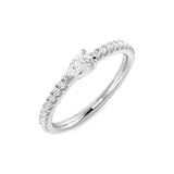 Pear-shaped diamond engagement ring with side diamonds in white gold