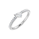 Pear cut diamond solitaire ring with side diamonds in white gold