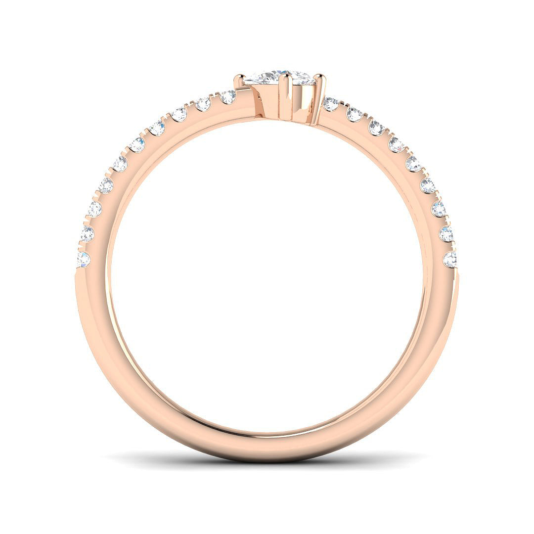 Pear cut diamond solitaire ring with side diamonds in rose gold