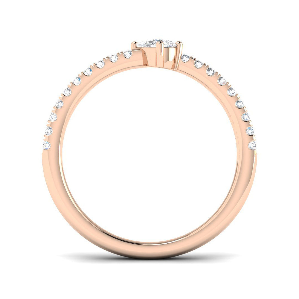 Pear cut diamond solitaire ring with side diamonds in rose gold