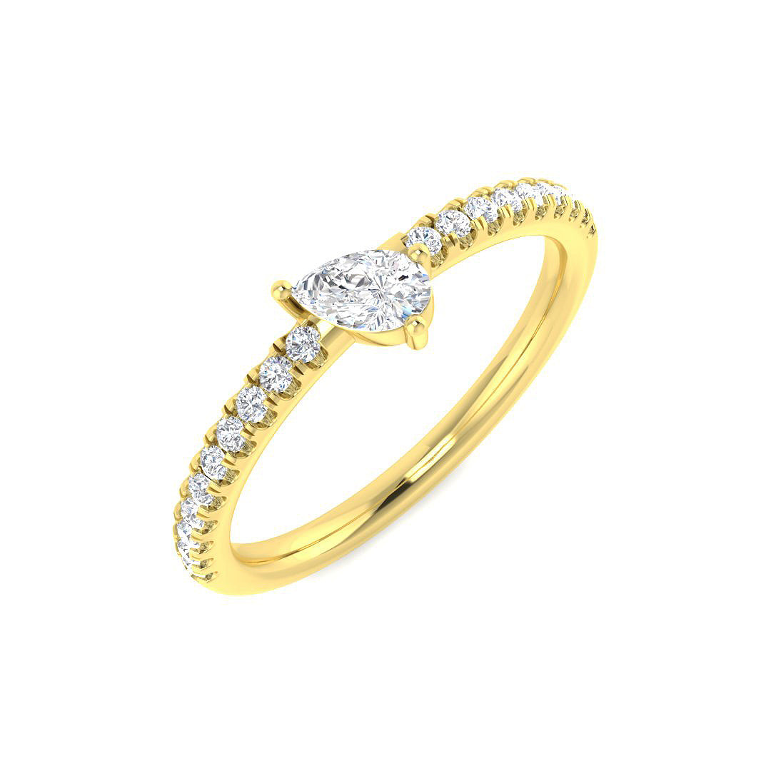 Pear cut diamond solitaire ring with side diamonds in yellow gold