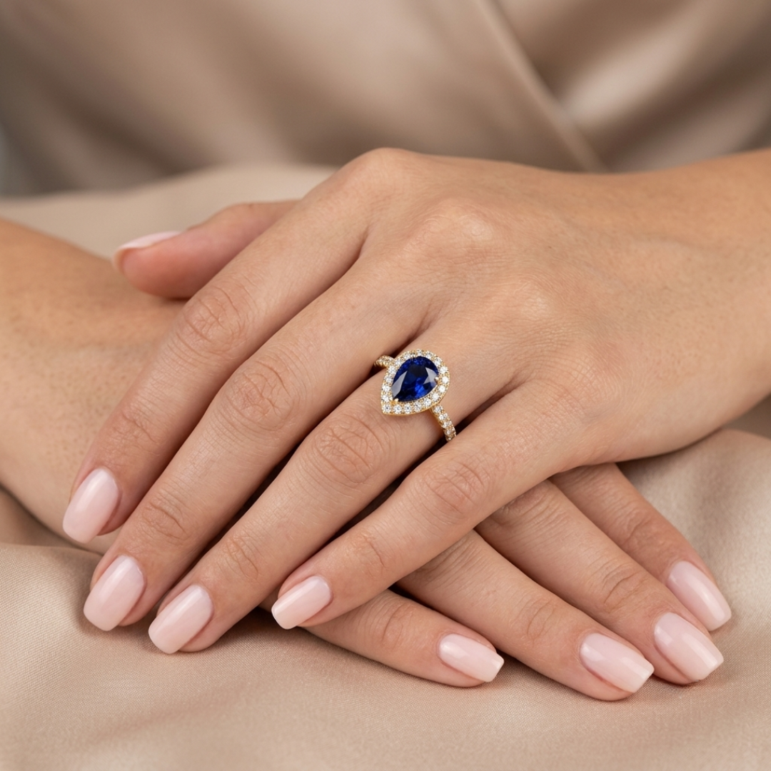 Pear Cut Blue Sapphire Halo Ring with Natural Round Diamond Pave Band