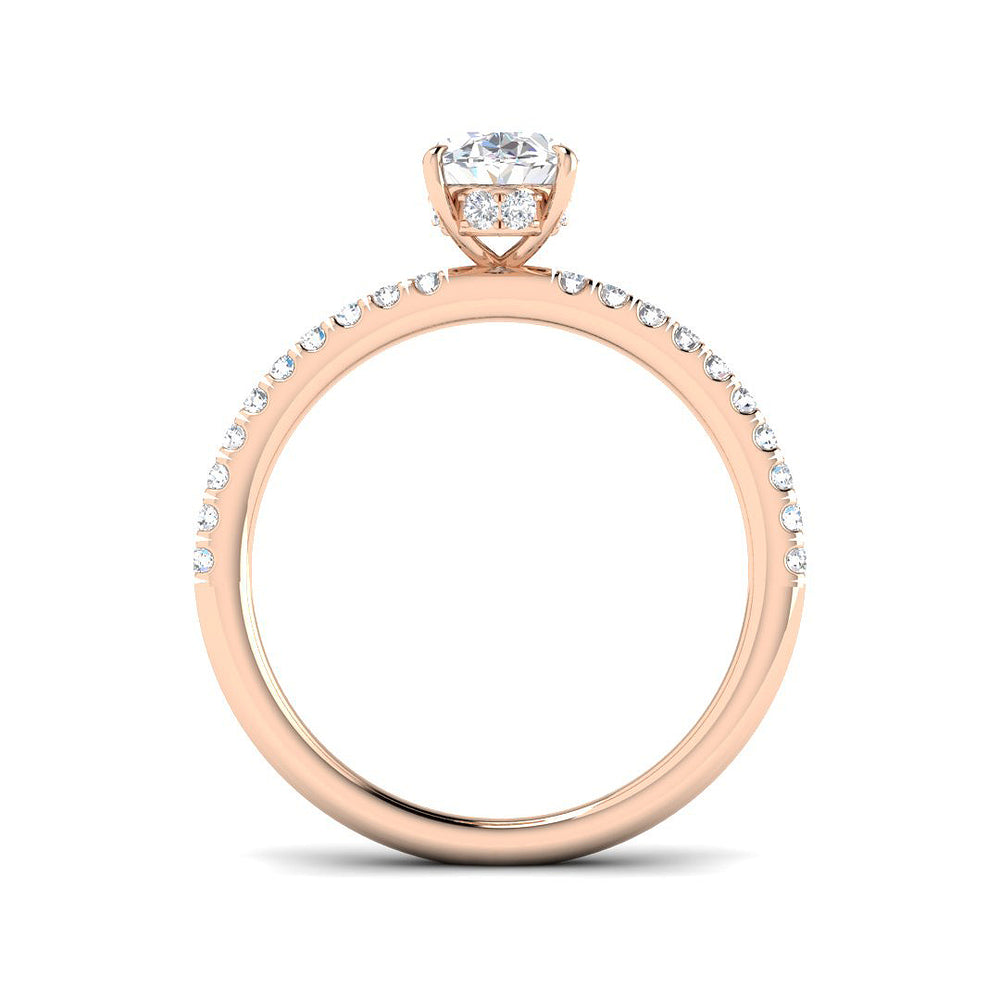 Rose gold oval diamond engagement ring with elegant pavé band design