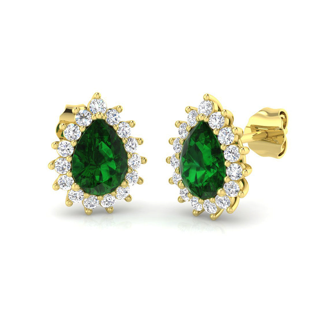 Pave set emerald lightning bolt stud earrings in gold