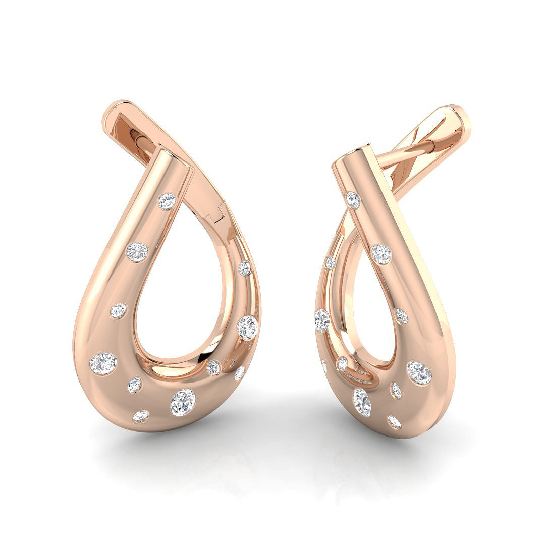 Elegant 0.33Ct Scattered Diamond Teardrop Twist Hoop Earrings