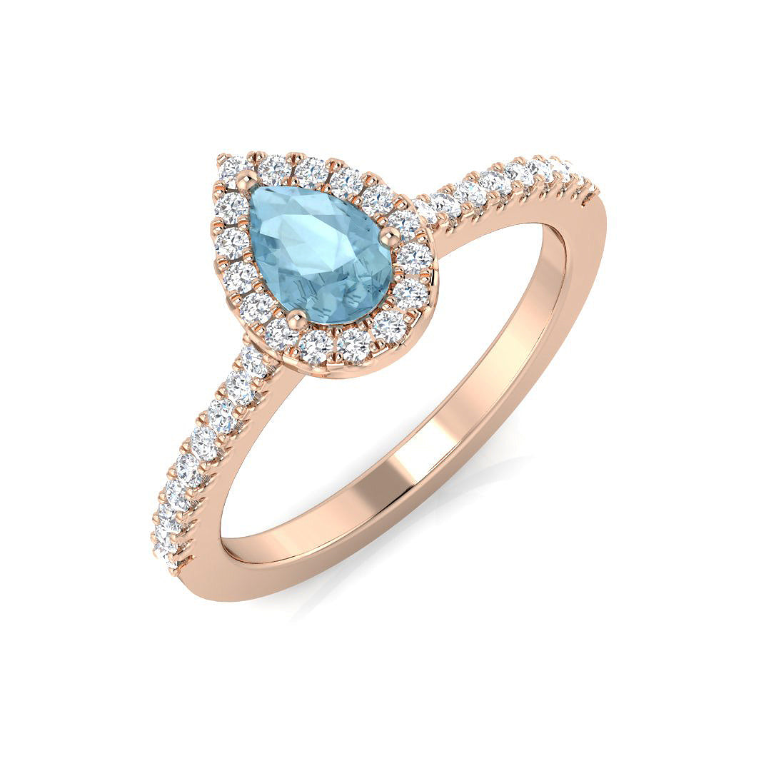 Pear Shaped Aquamarine Halo Ring in Gold