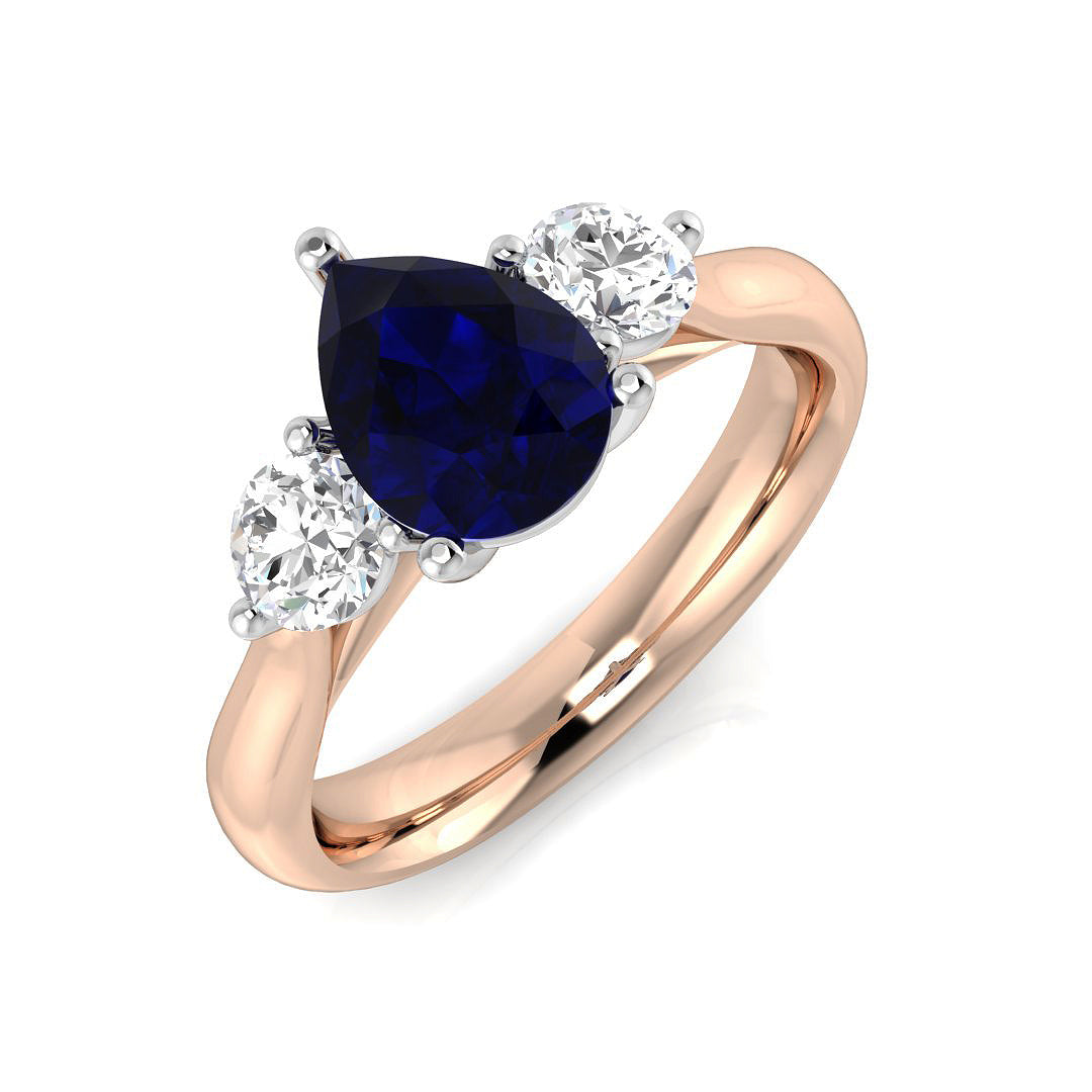 Pear Cut Blue Sapphire Three Stone Ring with Round Side Stones | UK Hallmarked