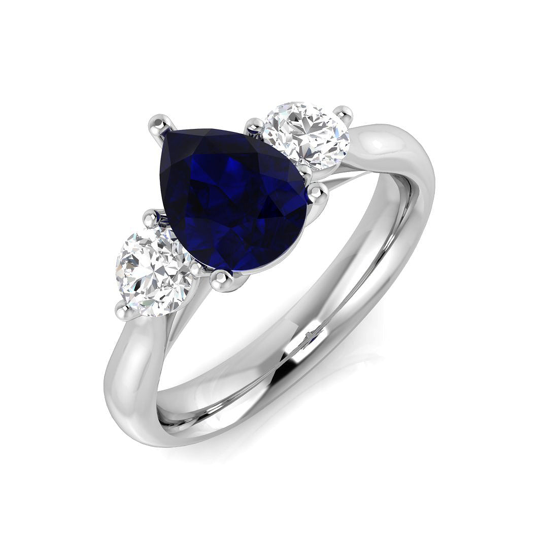 Pear Cut Blue Sapphire Three Stone Ring with Round Side Stones | UK Hallmarked