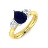 Pear Cut Blue Sapphire Three Stone Ring with Round Side Stones | UK Hallmarked