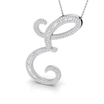 Gold initial pendant with baguette and round cut diamonds.
