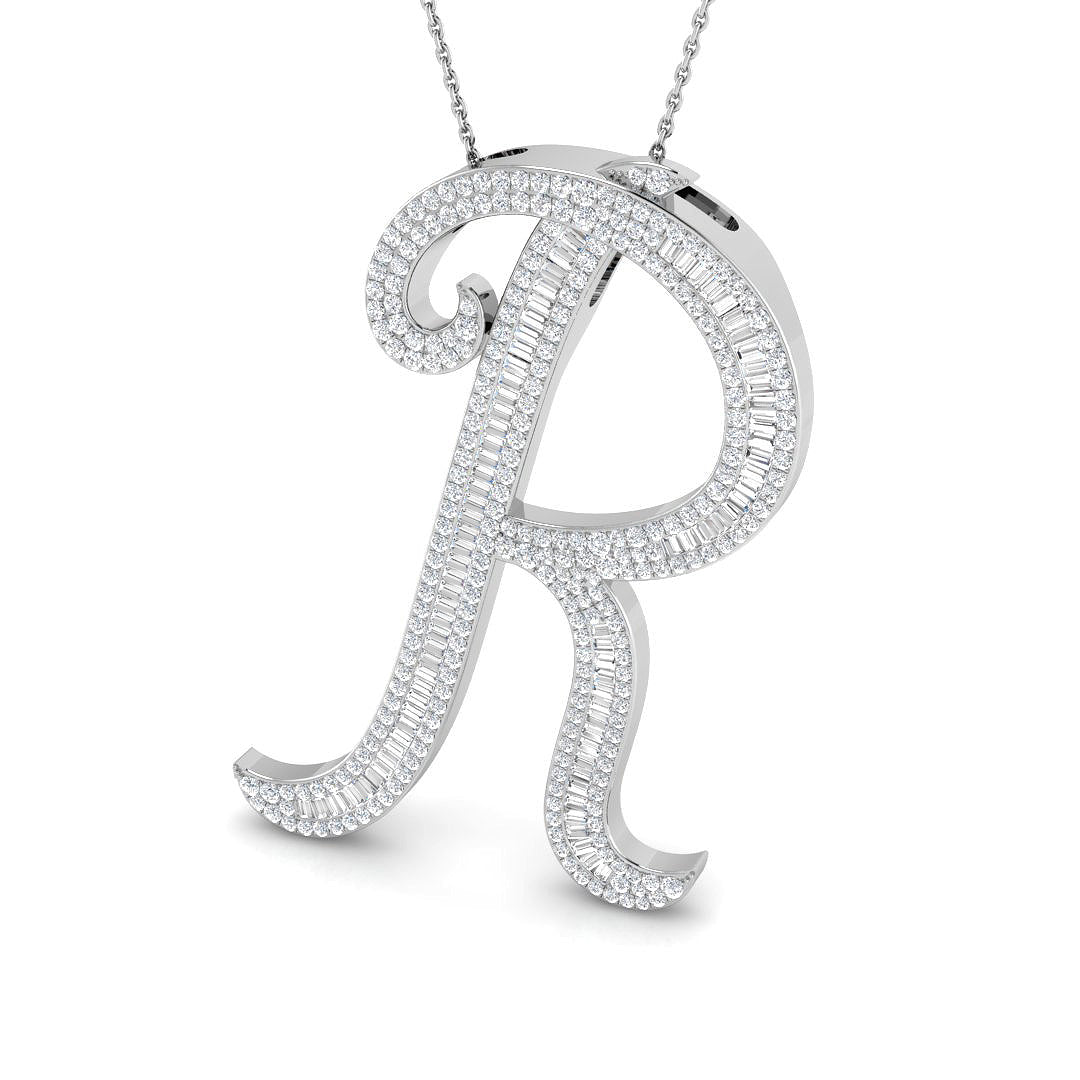 Gold initial pendant with baguette and round cut diamonds.