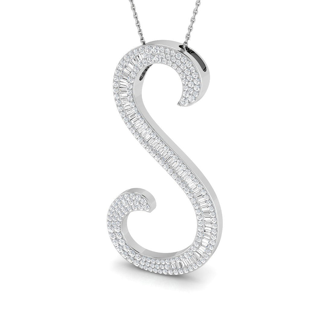 Gold initial pendant with baguette and round cut diamonds.