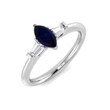 Marquise Blue Sapphire Ring with Baguette Diamonds Trilogy Design | Gold & Platinum