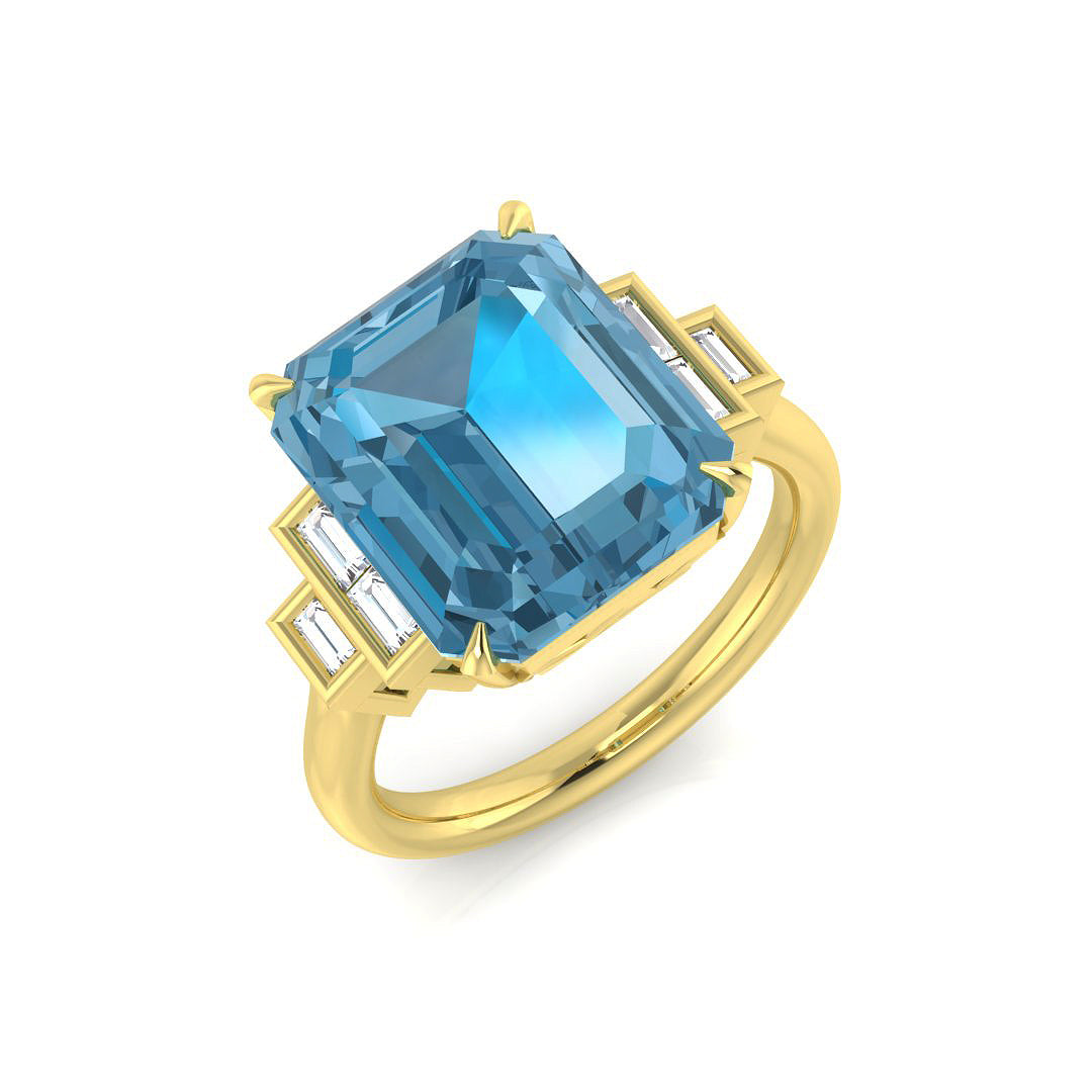 Yellow Gold Blue Topaz Solitaire Ring with Baguette Diamond Side Stones