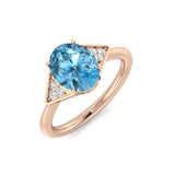 Rose Gold Oval Cut Blue Topaz Gemstone Ring with Side Diamonds