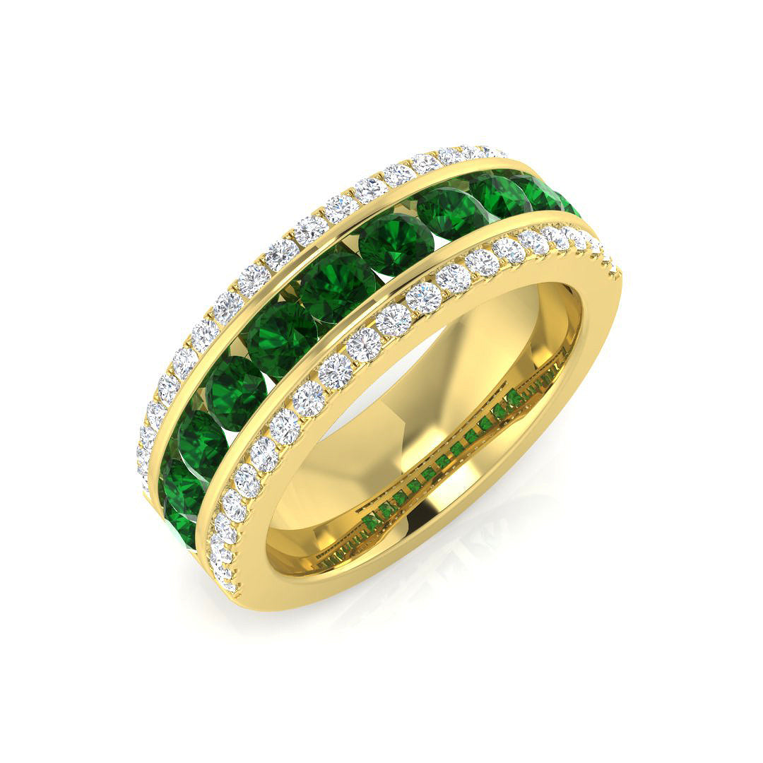 Emerald Half Eternity Ring featuring vibrant emeralds and sparkling diamond pavé in a gold band.