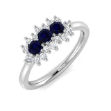 Blue sapphire diamond three stone ring with floral cluster
