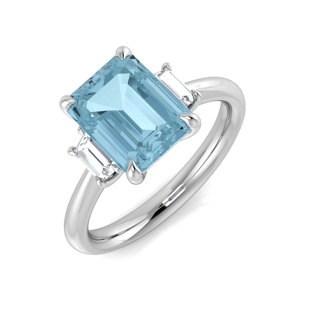 Emerald Cut Aquamarine Three Stone Ring in White Gold