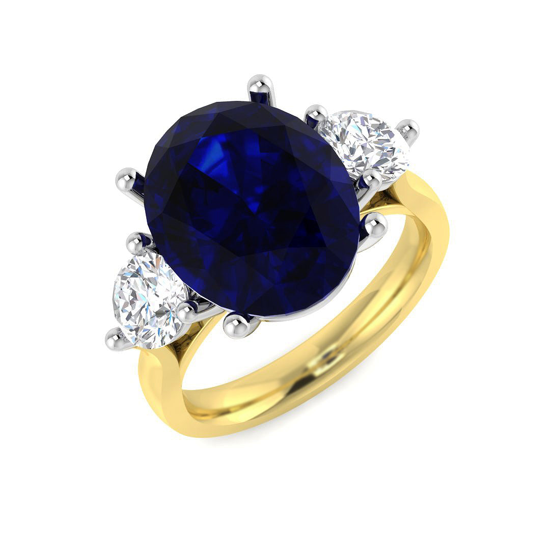 Blue Sapphire Three Stone Ring in Gold