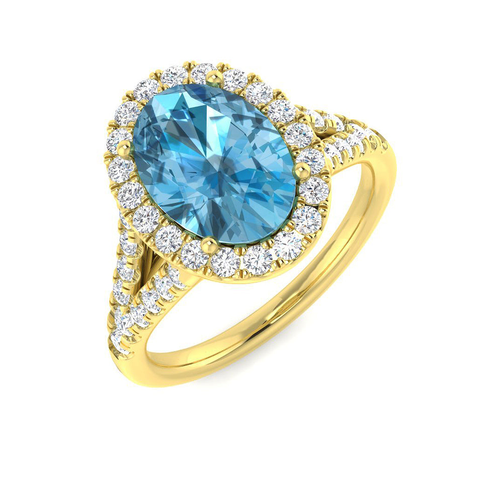 Oval Blue Topaz Halo Diamond Ring in Yellow Gold