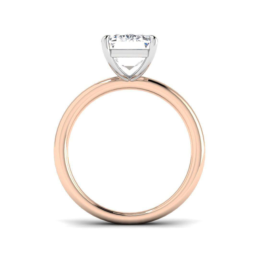 Two-tone ring with rose gold band and silver diamond on a white background
