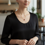 Bezel-Set Round Ruby Solitaire Pendant Necklace.