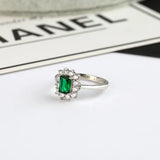 1.50 Carat Emerald and Natural Diamond Cluster Ring