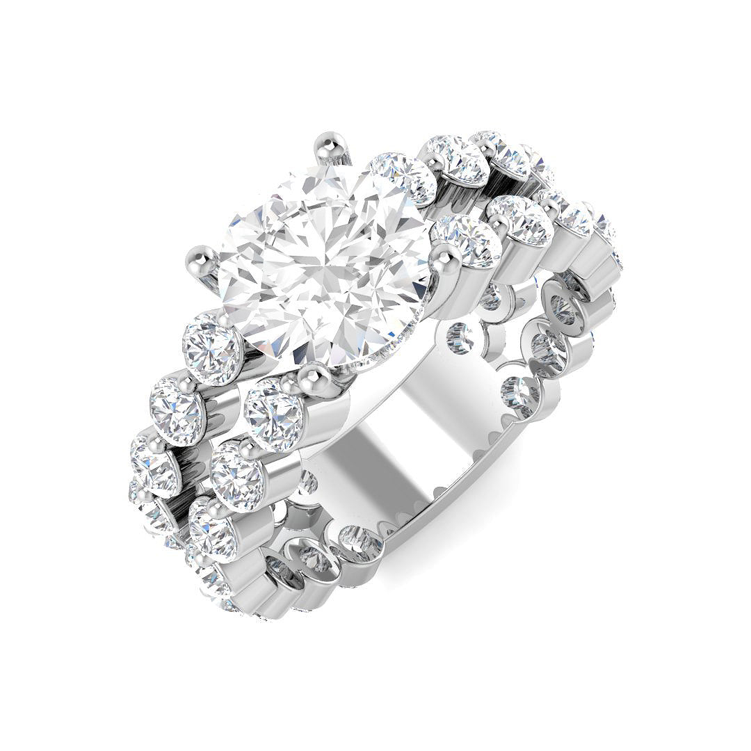 Silver ring with multiple diamonds on a white background