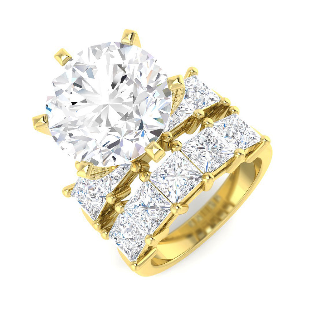 Gold ring with large diamond and smaller princess-cut diamonds on a white background