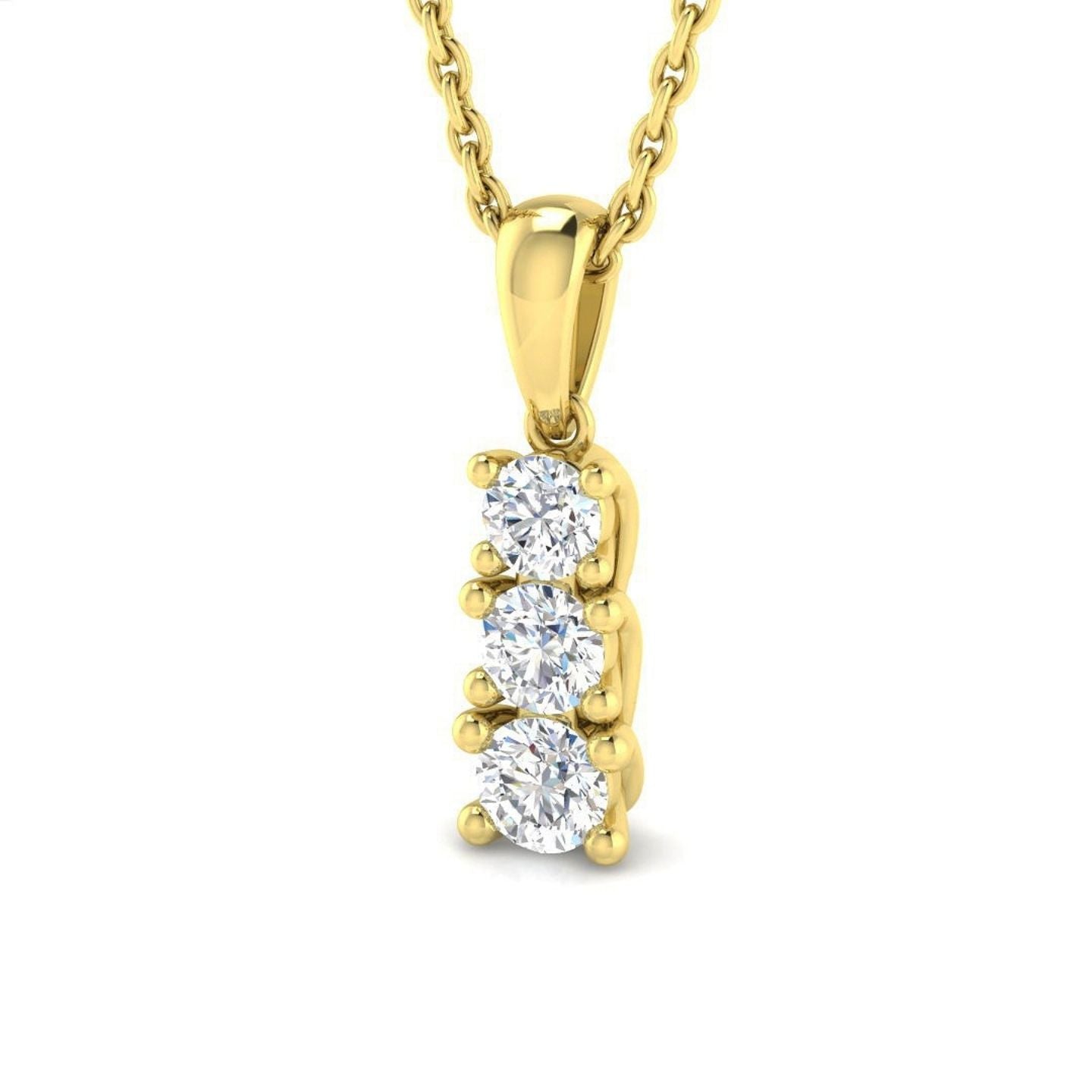 Gold necklace with a three-stone diamond pendant on a white background