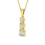 Gold necklace with three diamond pendants on a white background