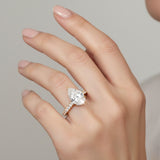 Yellow gold pear shape diamond ring with pavé detailing