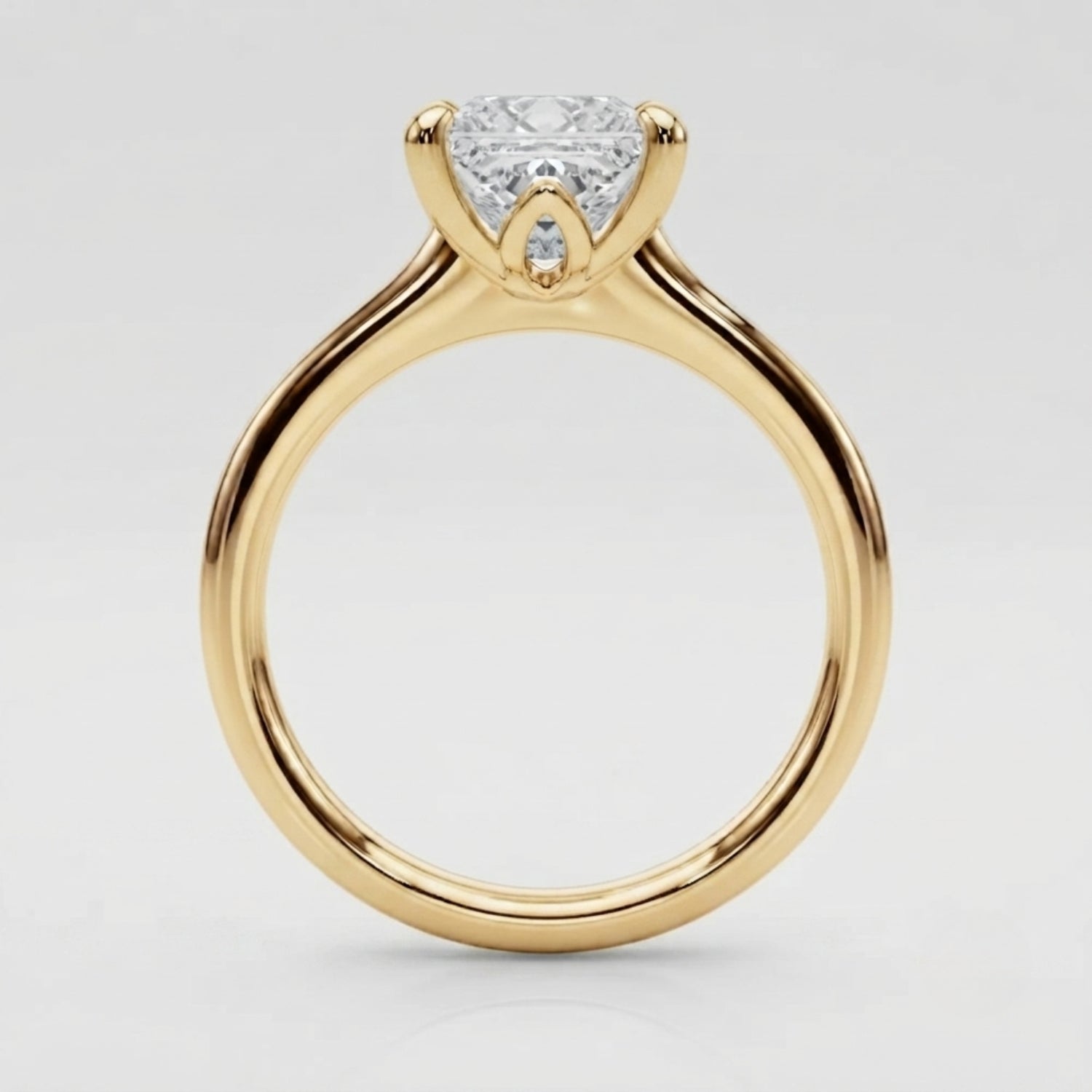 Traditional four-prong setting holding a brilliant princess-cut lab-grown diamond ring.