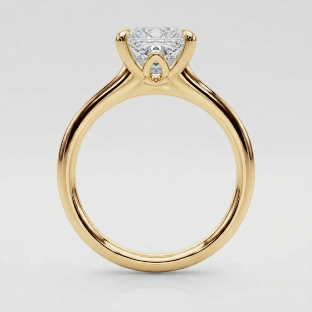 Traditional four-prong setting holding a brilliant princess-cut lab-grown diamond ring.